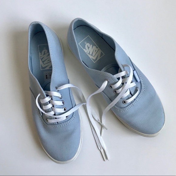 vans classic slip ons white women's